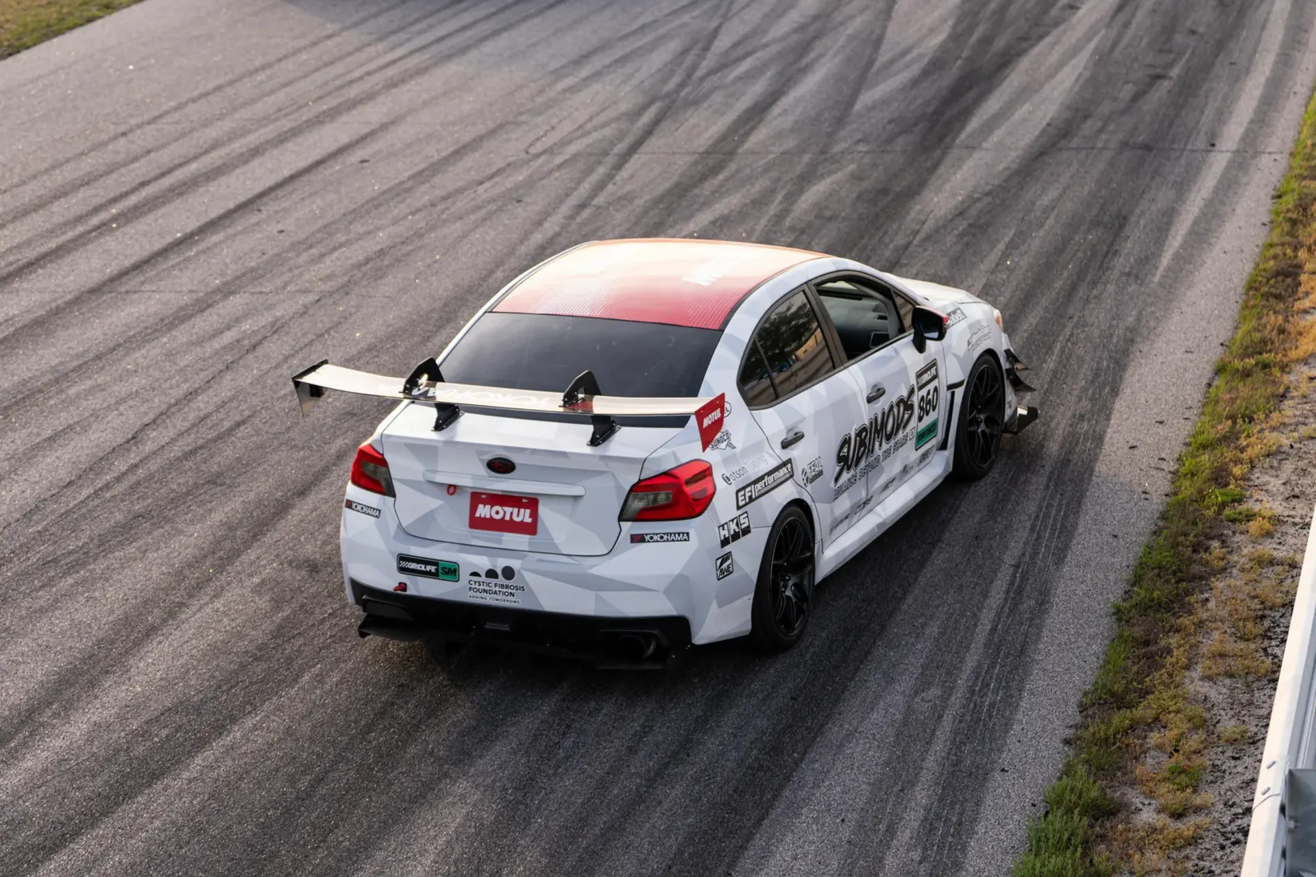 Subimods Subaru race car at speed